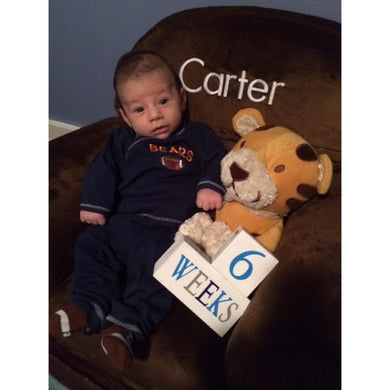 Baby Carter in Rocker with baby age blocks